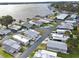 Aerial view of community with waterfront access, and a red star indicating the location of the property at 662 Sinclair Cir, Tavares, FL 32778