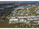 This high-angle shot shows the property in a well-planned community near local amenities and scenic waterfront views at 662 Sinclair Cir, Tavares, FL 32778