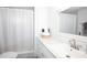 Updated bathroom featuring a vanity with a modern sink, and a walk-in shower at 662 Sinclair Cir, Tavares, FL 32778