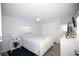 Bright bedroom featuring light color walls, ceiling fan, and ample closet space at 662 Sinclair Cir, Tavares, FL 32778