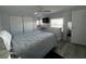 Inviting bedroom featuring a plush bed, ample storage, and a serene atmosphere at 662 Sinclair Cir, Tavares, FL 32778