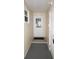 Covered entrance with a white door, leading into the home at 662 Sinclair Cir, Tavares, FL 32778