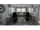 Cozy living room with large windows, comfortable seating, and stylish decor creating a welcoming atmosphere at 662 Sinclair Cir, Tavares, FL 32778
