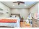 Bedroom featuring hardwood floors, recessed lighting, and decorative shelves at 848 Bucksaw Pl, Longwood, FL 32750