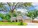 Traditional two-story home with an attached garage, manicured lawn, and comfortable front patio area for relaxing at 848 Bucksaw Pl, Longwood, FL 32750