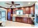 The kitchen is fully equipped with stainless steel appliances and ample counter space at 848 Bucksaw Pl, Longwood, FL 32750