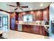 The kitchen is fully equipped with stainless steel appliances and ample counter space at 848 Bucksaw Pl, Longwood, FL 32750