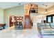 Spacious open-concept living room with vaulted ceilings, staircase, and access to kitchen at 848 Bucksaw Pl, Longwood, FL 32750