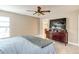 Spacious main bedroom with a ceiling fan and a closet in the background at 848 Bucksaw Pl, Longwood, FL 32750