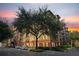 Upscale urban building at sunset, featuring attractive architectural details at 911 N Orange Ave # 448, Orlando, FL 32801