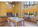 Community kitchen with large island and seating at 911 N Orange Ave # 448, Orlando, FL 32801