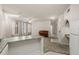 Open floor plan showing kitchen, granite island, and living room with carpet at 911 N Orange Ave # 448, Orlando, FL 32801