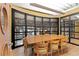 Community meeting room with large table and chairs at 911 N Orange Ave # 448, Orlando, FL 32801