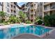 Inviting community pool with ample deck space at 911 N Orange Ave # 448, Orlando, FL 32801