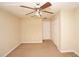 Bedroom with ceiling fan and double door closet at 980 Crestwood Commons Ave, Ocoee, FL 34761