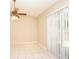 Dining area with tile floor, sliding glass doors, and ceiling fan at 980 Crestwood Commons Ave, Ocoee, FL 34761