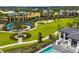 Aerial view of community park, showcasing playground and recreational areas near luxury homes at 1015 Jack Nicklaus Ct, Kissimmee, FL 34747