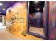 Hallway with Star Wars murals, custom door, and space themed playroom at 1015 Jack Nicklaus Ct, Kissimmee, FL 34747