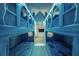 A room with two ice castle-themed bunk beds and blue design elements at 1015 Jack Nicklaus Ct, Kissimmee, FL 34747