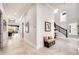 Bright foyer with tile floors, high ceilings, staircase and entry to other rooms at 1015 Jack Nicklaus Ct, Kissimmee, FL 34747