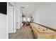 Spacious game room featuring a shuffleboard table and a view of the leather couches at 1015 Jack Nicklaus Ct, Kissimmee, FL 34747