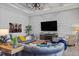 Living room features stylish decor, comfortable sofas, and ample natural light at 1015 Jack Nicklaus Ct, Kissimmee, FL 34747