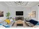 Cozy living room showcases stylish decor, comfortable sofas, and a large television for ultimate relaxation at 1015 Jack Nicklaus Ct, Kissimmee, FL 34747