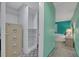A closet with shelving and a four-drawer filing cabinet with patterned flooring in the hallway at 1050 Bob White Trl, Chuluota, FL 32766
