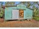 Exterior view of work shed with open barn doors at 1050 Bob White Trl, Chuluota, FL 32766