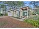 Exterior view of a single-story house with an attached garage at 1050 Bob White Trl, Chuluota, FL 32766