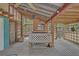 Rustic outdoor kitchen featuring wood structure, lattice accents, and ample countertop space for food preparation and entertaining at 1050 Bob White Trl, Chuluota, FL 32766