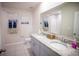 Clean bathroom with dual vanity and granite countertop at 110 Rosedale Dr, Deltona, FL 32738