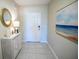 Bright entryway with decorative console table at 110 Rosedale Dr, Deltona, FL 32738