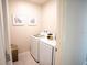 Convenient laundry room with washer and dryer at 110 Rosedale Dr, Deltona, FL 32738