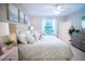 Spacious main bedroom with a king-size bed and en-suite bathroom at 110 Rosedale Dr, Deltona, FL 32738