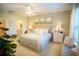 Main bedroom with king-size bed and neutral decor at 110 Rosedale Dr, Deltona, FL 32738
