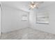Bright bedroom featuring new floors, an updated ceiling fan, and natural light from two windows at 1113 Leeward Dr, Deltona, FL 32738