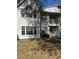 Condominium building exterior with multiple windows and outdoor balcony at 11574 Westwood Blvd # 1122, Orlando, FL 32821