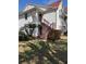 Condominium complex exterior featuring stairwell access and well-maintained landscaping at 11574 Westwood Blvd # 1122, Orlando, FL 32821