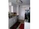 Efficient kitchen space with bright cabinets, granite countertops, and a stainless steel dishwasher at 11574 Westwood Blvd # 1122, Orlando, FL 32821
