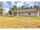 Large backyard with ample space for outdoor activities and potential landscaping opportunities at 12 Pecan Drive Loop, Ocala, FL 34472