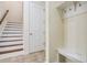 Elegant staircase with wood and white risers at 1413 Resolute St, Celebration, FL 34747