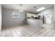 Kitchen with tiled floor, wood countertops, and appliances at 1616 Sunburst Way, Kissimmee, FL 34744