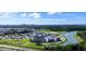 An aerial view of modern community near downtown Orlando with a lake and fountain at 2225 Valentine Aly, Orlando, FL 32804