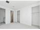 Spacious bedroom featuring neutral tones, walk-in closets, and easy access to an en suite bathroom at 2225 Valentine Aly, Orlando, FL 32804