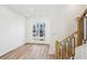Living room with hardwood floors, a staircase, and natural light at 2225 Valentine Aly, Orlando, FL 32804