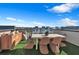Stylish rooftop dining setup with views, ideal for entertaining at 2225 Valentine Aly, Orlando, FL 32804