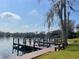 Scenic view of the dock and lake, perfect for enjoying waterfront living at 2500 Lee Rd # 202, Winter Park, FL 32789