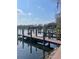 Community boat dock featuring boat slips and a clear view of the water and horizon at 2500 Lee Rd # 202, Winter Park, FL 32789