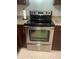 Stainless steel stove and oven, modern cabinetry and granite countertops at 2500 Lee Rd # 202, Winter Park, FL 32789